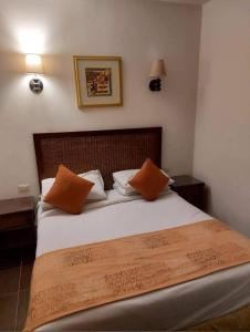 Postel nebo postele na pokoji v ubytování Porto South Beach