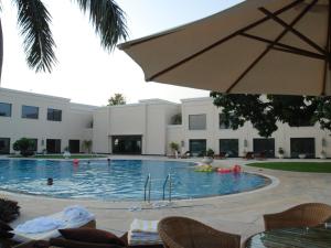 The swimming pool at or close to The Lalit Temple View