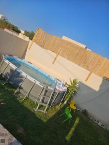 Πισίνα στο ή κοντά στο Maison a louer proche plage aghir djerba
