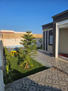 Πισίνα στο ή κοντά στο Maison a louer proche plage aghir djerba