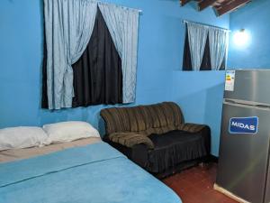 Ένα ή περισσότερα κρεβάτια σε δωμάτιο στο Casa independiente Mundial de rally