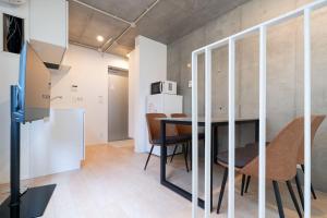a kitchen and dining room with a table and chairs at PASEO ichigayadaimachi I in Tokyo +53 photos