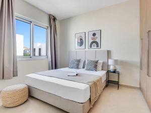 Ένα ή περισσότερα κρεβάτια σε δωμάτιο στο Sanders Mythical Blue Villas +38 φωτογραφίες