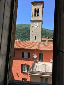 a view of a building with a clock tower at Bed & Breakfast Dèco in Torno
