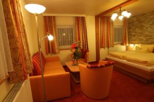 Letto o letti in una camera di Wanderhotel Grüner Baum