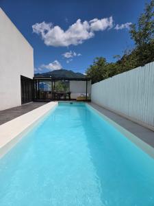 a swimming pool in the backyard of a house at Stay Timoga - Private Poolvilla in Muju