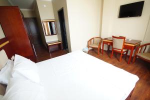 Postel nebo postele na pokoji v ubytování Hotel 725 + 17 fotografií
