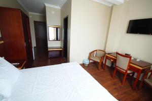 Postel nebo postele na pokoji v ubytování Hotel 725