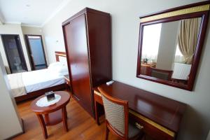 Postel nebo postele na pokoji v ubytování Hotel 725
