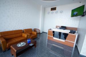TV a/nebo společenská místnost v ubytování Hotel 725