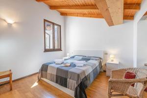 Ένα ή περισσότερα κρεβάτια σε δωμάτιο στο Skylight - Happy Rentals