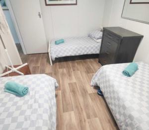 Ένα ή περισσότερα κρεβάτια σε δωμάτιο στο A Golden Barrel