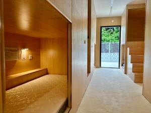 Ένα ή περισσότερα κρεβάτια σε δωμάτιο στο 和平行旅全女旅宿-海珠广场店