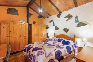 En eller flere senge i et værelse på Casa Valerón Relax