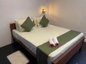 Ένα ή περισσότερα κρεβάτια σε δωμάτιο στο The Pearl Safari Resort +39 φωτογραφίες