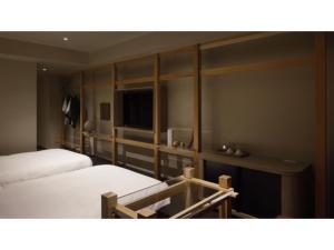 Postel nebo postele na pokoji v ubytování SOKI KANAZAWA - Vacation STAY 40333v + 21 fotografií