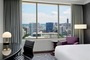 Postel nebo postele na pokoji v ubytování Hilton Atlanta + 67 fotografií