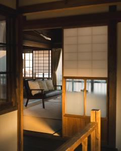 Ένα ή περισσότερα κρεβάτια σε δωμάτιο στο 自去来