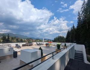 a view from the balcony of a house at SUGARFAME- Guest House in Sarnitsa