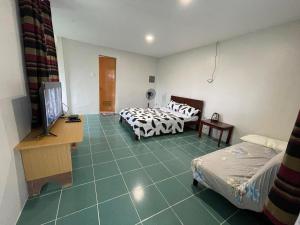 Ένα ή περισσότερα κρεβάτια σε δωμάτιο στο Otrera Transient House