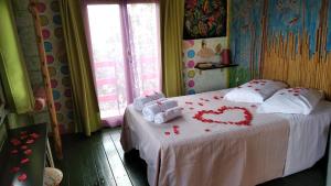 Ένα ή περισσότερα κρεβάτια σε δωμάτιο στο Casa sull'Albero +12 φωτογραφίες