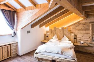Postel nebo postele na pokoji v ubytování Alpstyle Hotel Albolina Wellness & Beauty