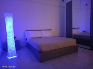 Ένα ή περισσότερα κρεβάτια σε δωμάτιο στο Casa Amor