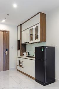 Η κουζίνα ή μικρή κουζίνα στο Short-term apartment with full furniture