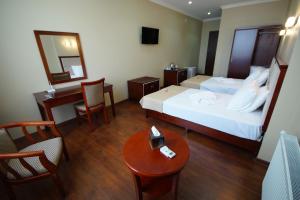Postel nebo postele na pokoji v ubytování Hotel 725