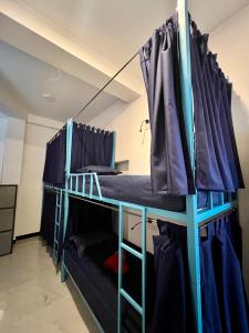 Postel nebo postele na pokoji v ubytování Island Wave Surf Hostel + 44 fotografií