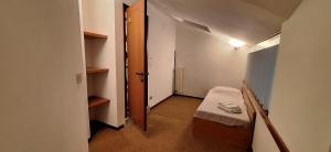 En eller flere senge i et værelse på Punta Ala Bilocale Vista Mare 6 Posti Letto! Punta Ala Monolocale Vista Mare 4 Posti Letto!