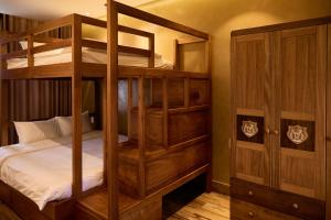 a bunk bed room with two bunk beds at Yên Riverside Villa - Homestay Huế in Hue +42 photos