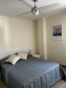 San Pedro Urban Suites房間的床