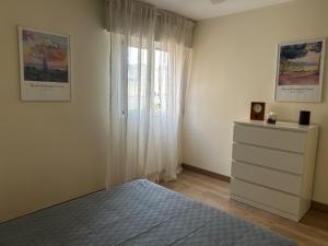 San Pedro Urban Suites房間的床