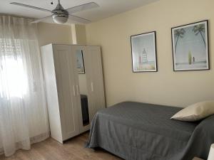 San Pedro Urban Suites房間的床 +4 張相片