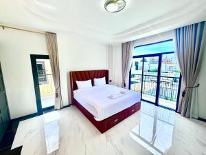 Ένα ή περισσότερα κρεβάτια σε δωμάτιο στο FLEX Pool Villa +29 φωτογραφίες
