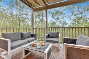 Un lugar para sentarse en Hole-in-One Haven 2bdr Villa