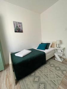 Ένα ή περισσότερα κρεβάτια σε δωμάτιο στο Happy M&S +11 φωτογραφίες