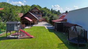an aerial view of a playground with a slide at Sándor Panzió 2 in Praid