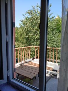 Balkón nebo terasa v ubytování Rossi Rest House + 257 fotografií