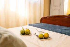 Postel nebo postele na pokoji v ubytování Le Tropical Nest - Idéal Couple & Famille - Jardin Privé - MER - Parking Privé - Quartier Calme - Clim - Wifi HD - 5min Plages - Linge de maison fourni gratuit