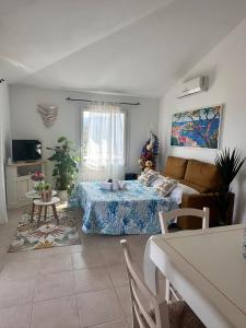 TV a/nebo společenská místnost v ubytování Ea Bianca Vibes