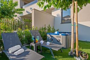 a barbecue in the backyard of a house at Frida in Vodice