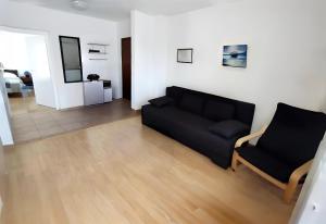 O zonă de relaxare la Amélie Apartments