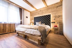 Postel nebo postele na pokoji v ubytování Alpstyle Hotel Albolina Wellness & Beauty