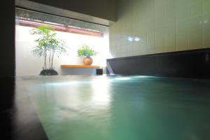 
The swimming pool at or near Ryokan Seiryu (Specialised in Hida beef)
