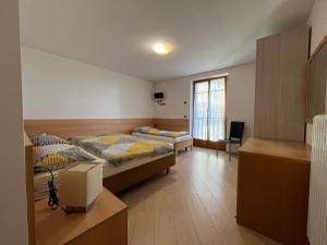 Ένα ή περισσότερα κρεβάτια σε δωμάτιο στο Aria Pura apartment