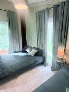 Ένα ή περισσότερα κρεβάτια σε δωμάτιο στο Forest Resort House