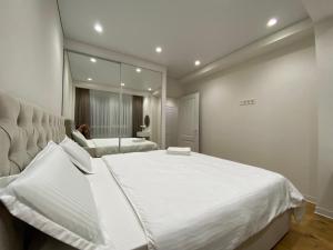 Postel nebo postele na pokoji v ubytování Apartament centru new Chisinau