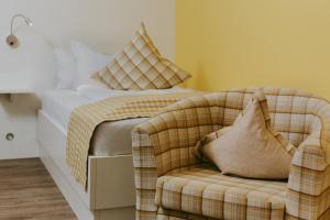 Postel nebo postele na pokoji v ubytování Hotel Drei Quellen Therme
